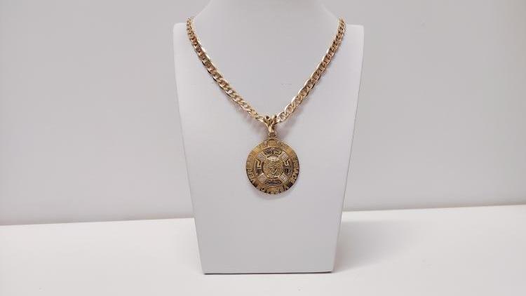 Importante collana con ciondolo Versace.