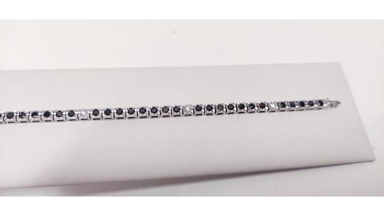 Tennis ReCarlo con Diamanti bianchi e neri per una Caratura di 1,25.