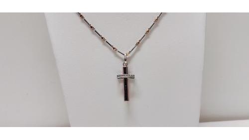 Croce con Diamanti Bianchi e Neri di Ct. 0,20 totale.
